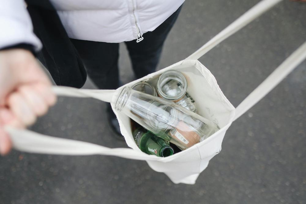 reusable bag filled with glass recycling