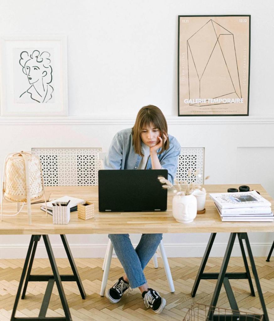 woman working on her laptop in a modern office