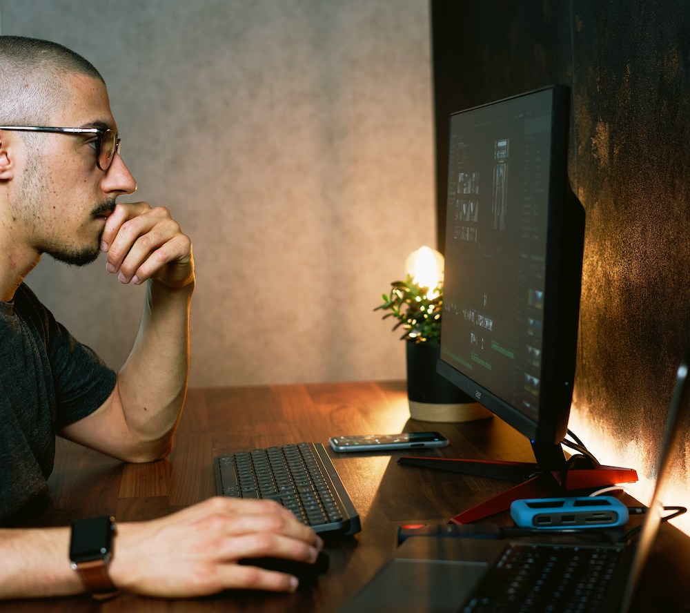 person reading on computer